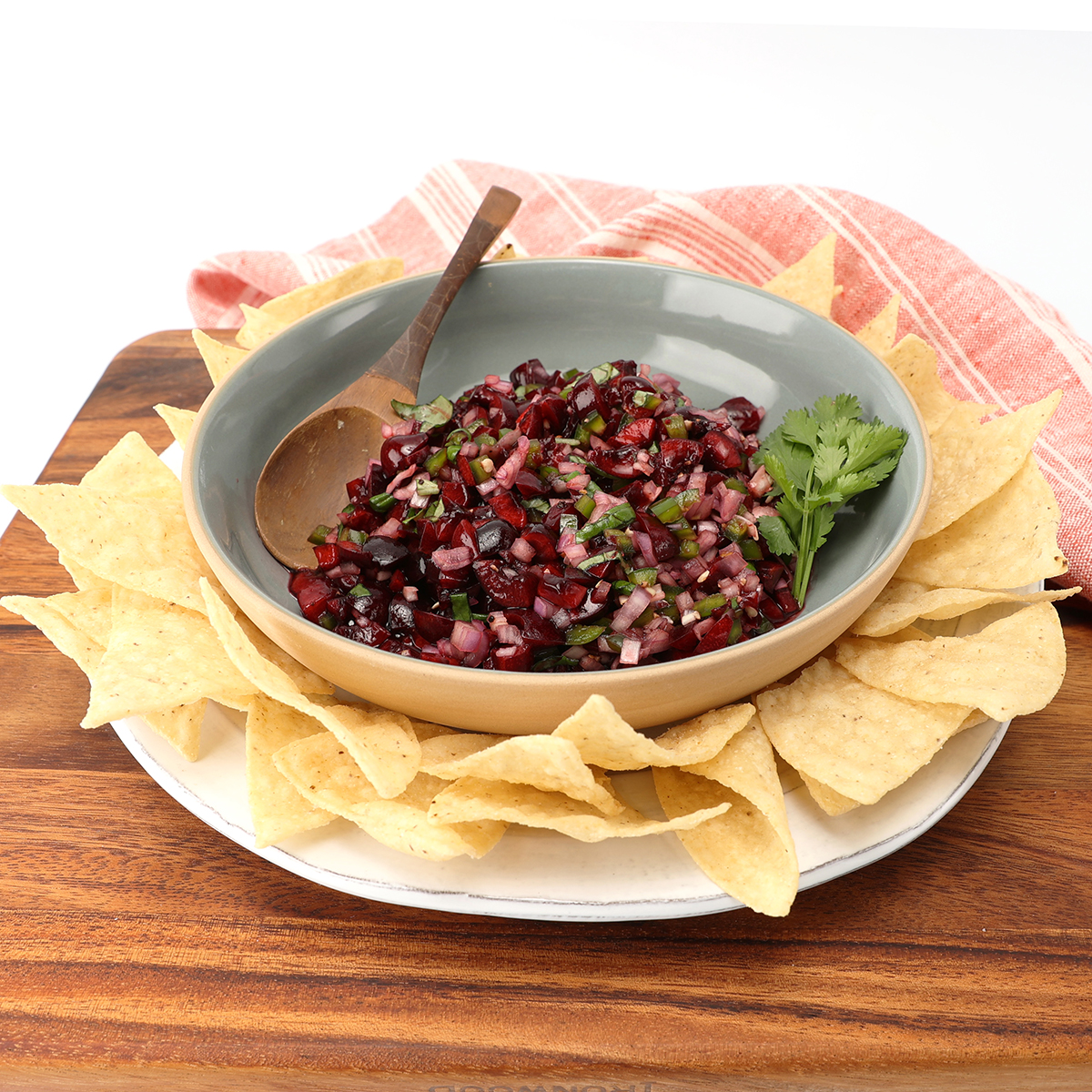 Bowl of cherry salsa with corn chips