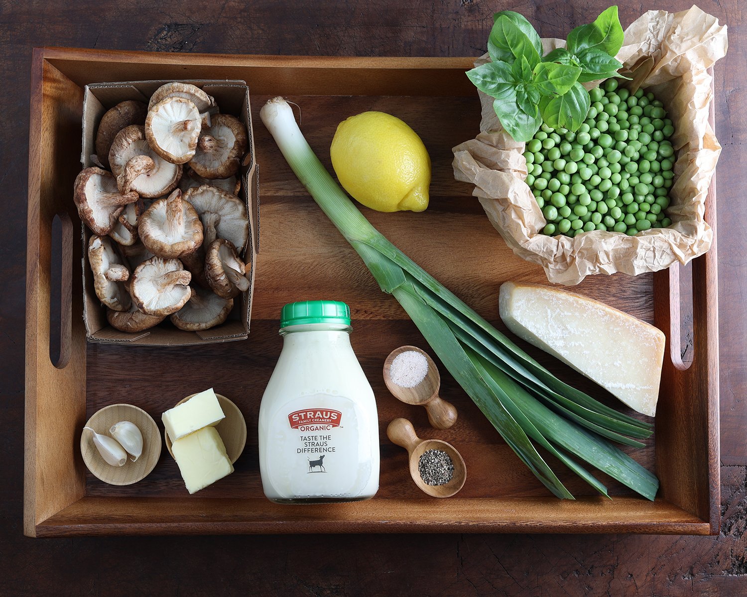 Ingredients shown are used to prepare fresh pea shiitake orecchiette pasta.