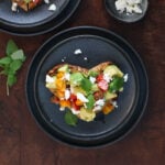 Honeymoon avocado toast served on a plate.