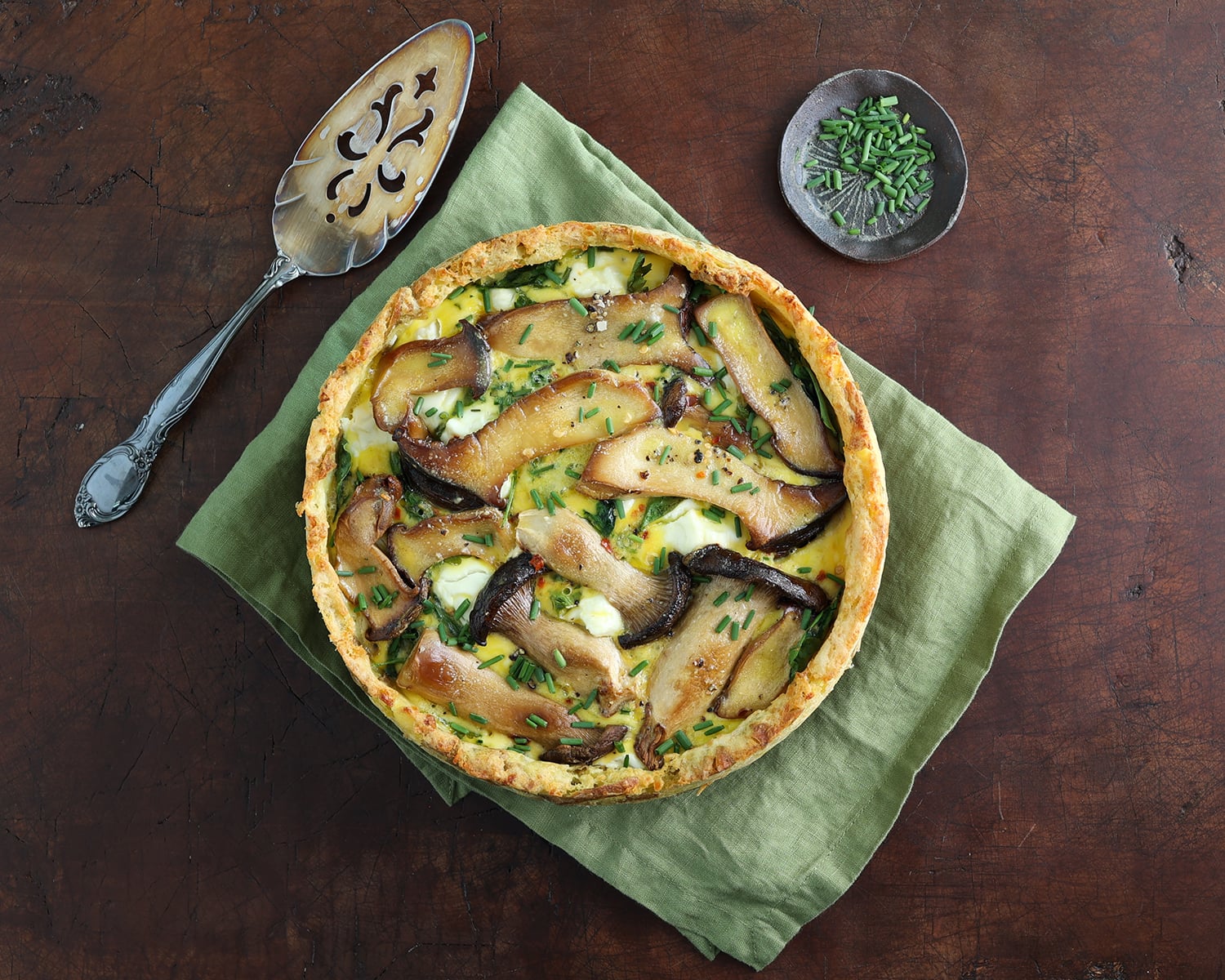 Quiche with a potato crust, roasted king trumpet mushrooms and melty goat cheese.