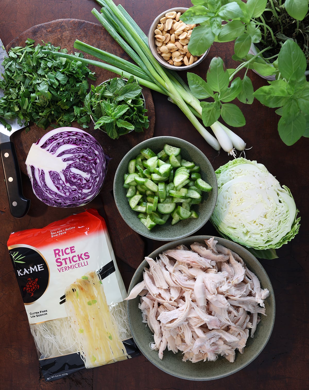 Fresh ingredients laid out that are used to prepare a healthy Vietnamese chicken salad.